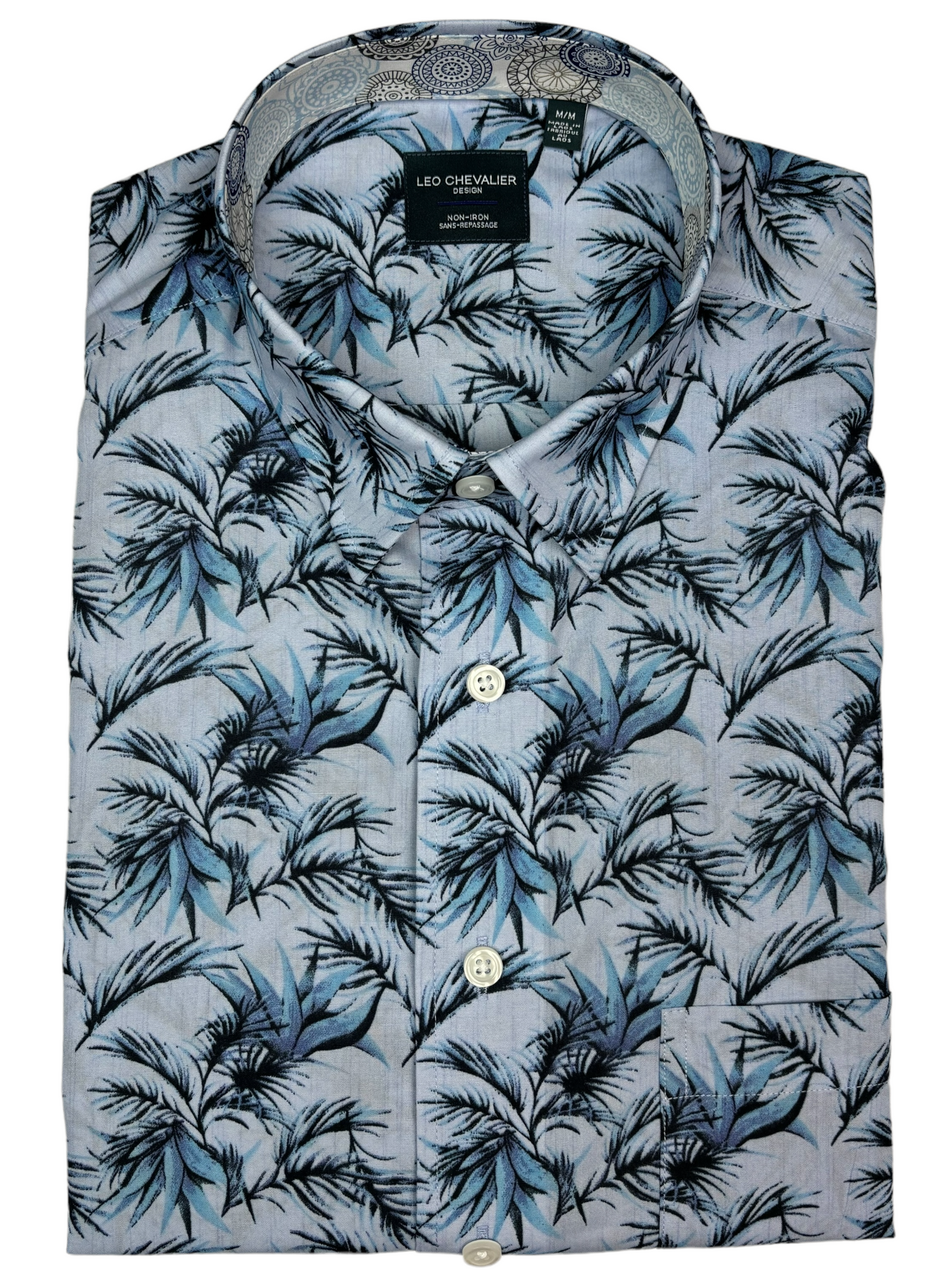 Chemise manches courtes bleue à motif tropical