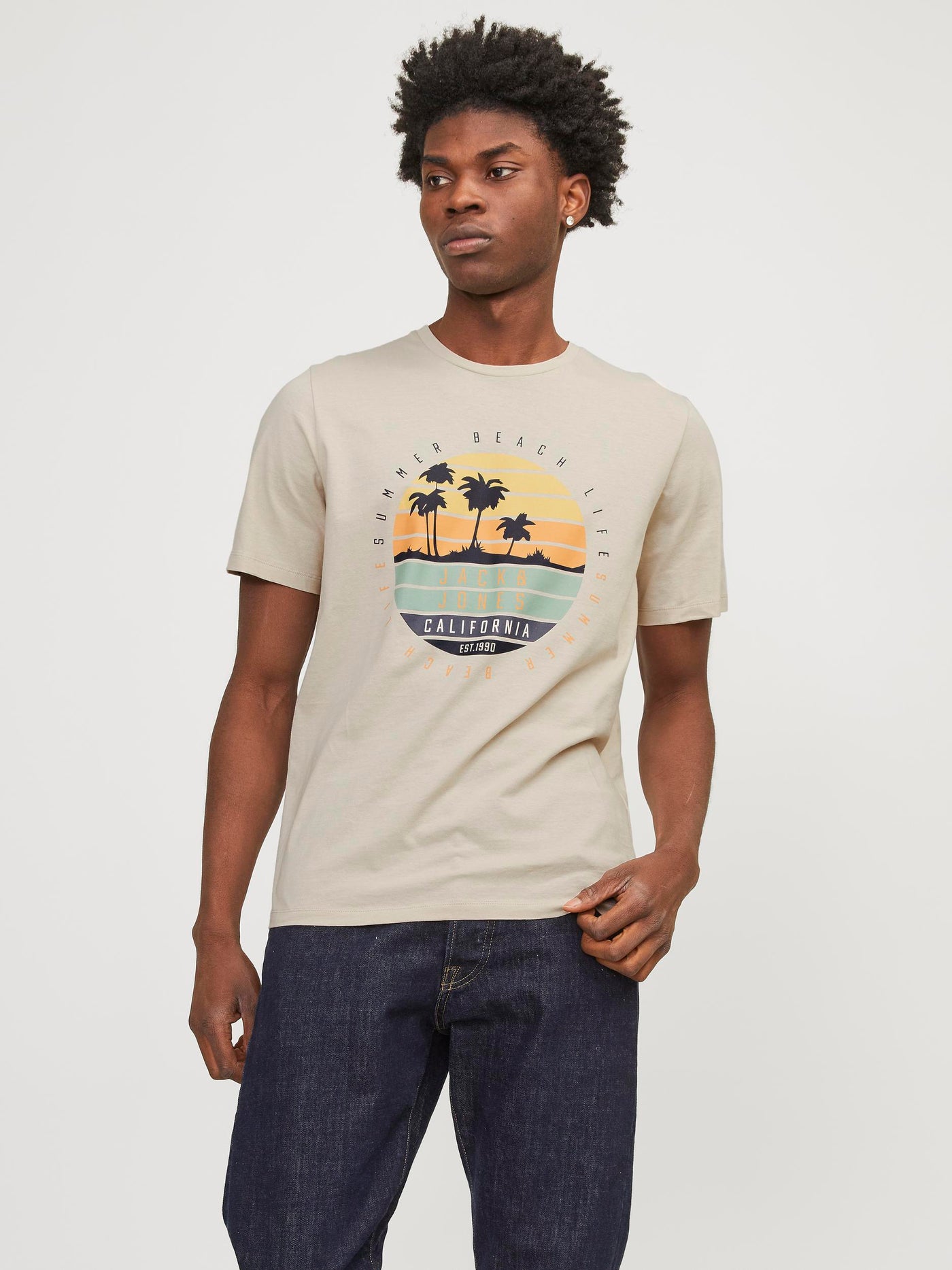 T-shirt beige à imprimé de palmiers