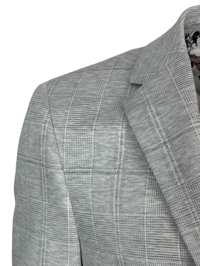 Veston gris à carreaux avec poches appliquées