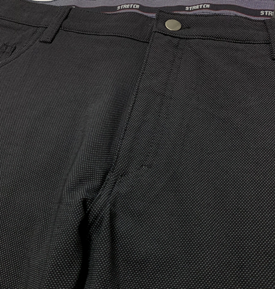Pantalon extensible noir à micro pois